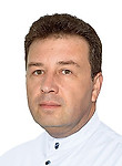 Комин Юрий Анатольевич — Онколог-маммолог