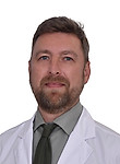 Суртаев Константин Евгеньевич — Онколог